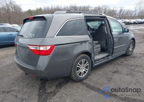 2011 Honda Odyssey Ex-L z USA, uszkodzony, nr VIN 5FNRL5H60BB082577